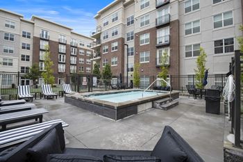 resort style pool and lounge chairs at 200 City View, Provo